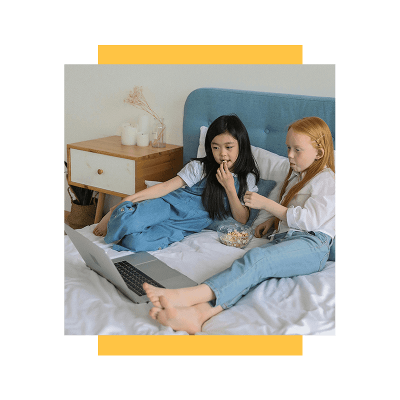 two girls watching movie