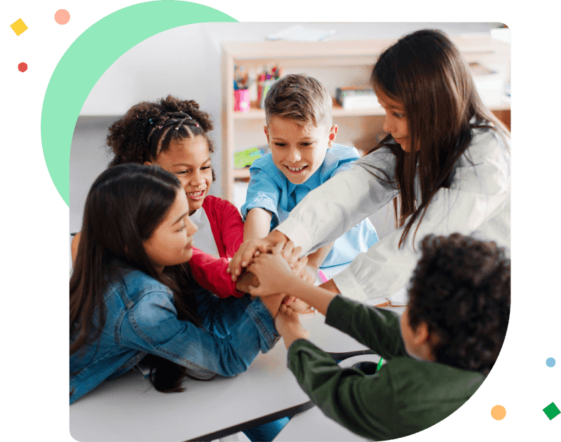 Team of diverse school children joining hands, sitting in circle in classroom, having bonding moment, feeling united and supported