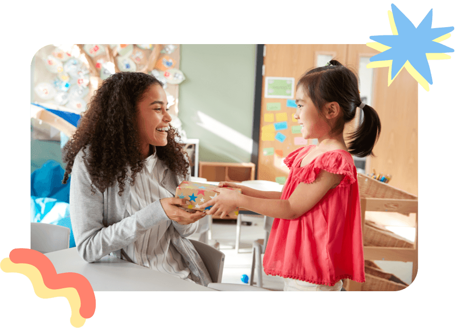 teacher receiving gift from student